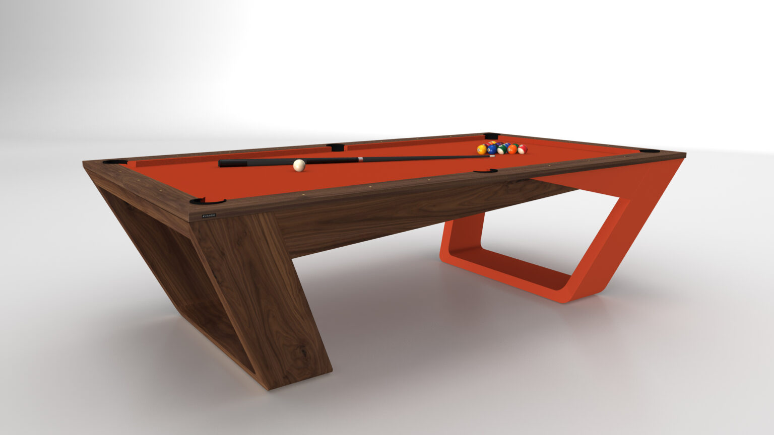 The Avettore Pool Table, a luxurious and modern game table, features an orange surface with a wooden frame set against a white backdrop. It has angular leg design and includes a cue stick and pool balls arranged at one end.