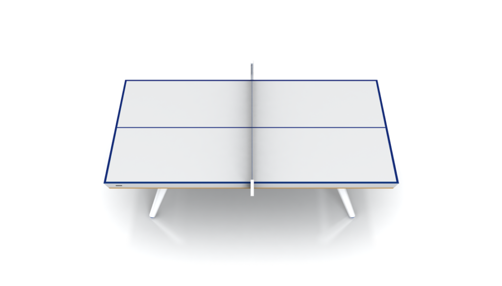The Hamptons Ping Pong Table is a minimalist luxury piece with a sleek, modern design. It features a white surface, thin blue outline, angled legs, and a net dividing the table into equal halves against a plain white background.