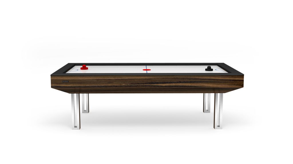 Discover the Executive Air Hockey Table with a modern wooden finish, sleek metal legs, and a minimalist design. It includes two pucks and two mallets, one red and one black, perfectly positioned for an exceptional playing experience.