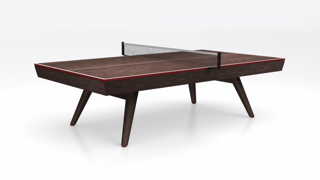 The Hamptons Ping Pong Table features a modern dark wood finish, angled legs, and a sleek black net, displayed on a plain white background.