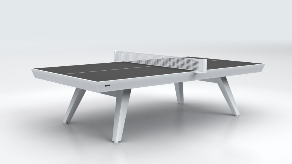 The Hamptons Ping Pong Table features a modern black and white design, angled legs, and a white net, showcased against a plain light grey background.