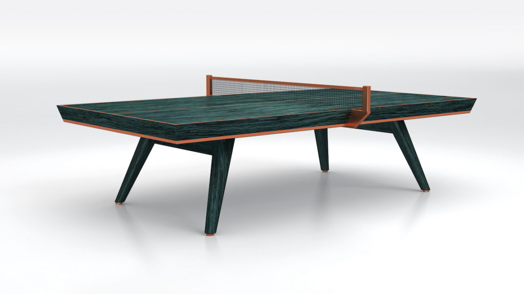 The Hamptons Ping Pong Table is a luxury game table with a modern touch, featuring a dark wood finish, eye-catching orange trim, sleek angled legs, and a high-quality net, all set against a plain white background.