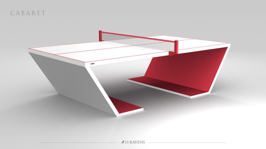 The Cabaret Ping Pong Table features a modern, angular white and red design with an asymmetrical shape, central net, "Cabaret" in the top left corner, and 11 Ravens branding at the bottom.