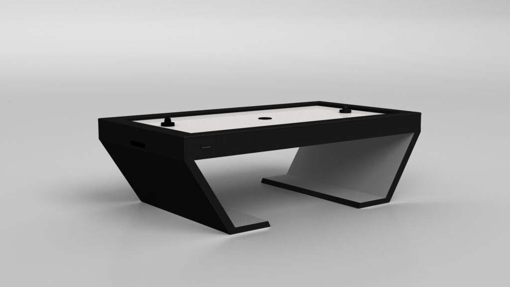 The Cabaret Air Hockey Table features a modern, minimalist angular design and sits on a light gray background. Two paddles and a puck rest on its smooth white playing surface.