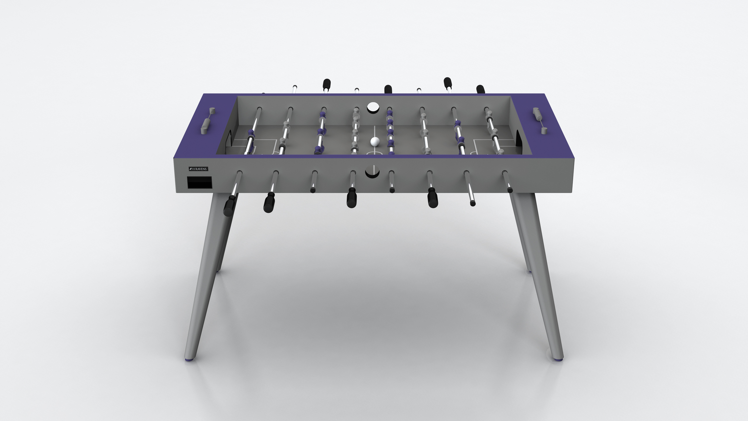 The Hamptons Foosball Table features a modern design with a gray body, purple trim, steel legs, and black handles, shown from the front against a plain white background.