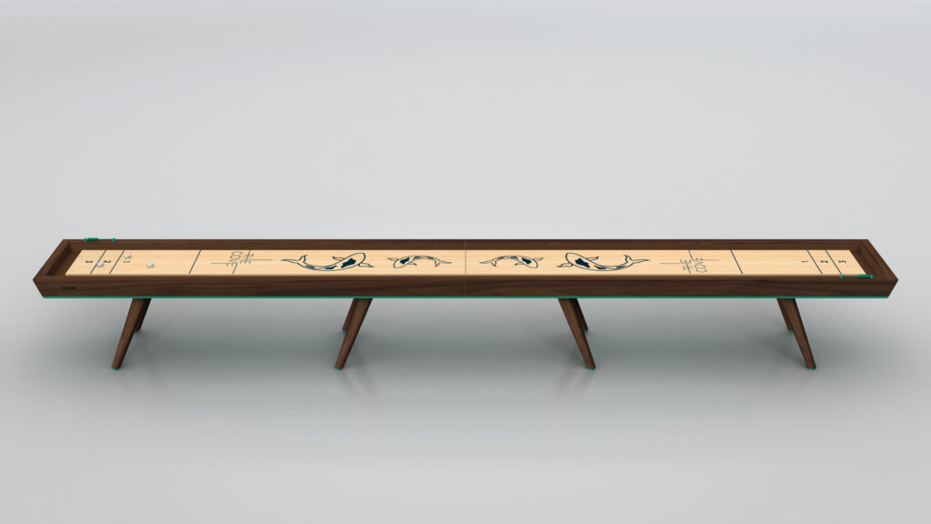 The Hamptons Shuffleboard Table, with its long wooden surface featuring orca designs and three sets of angled legs, stands out beautifully against a simple light background.