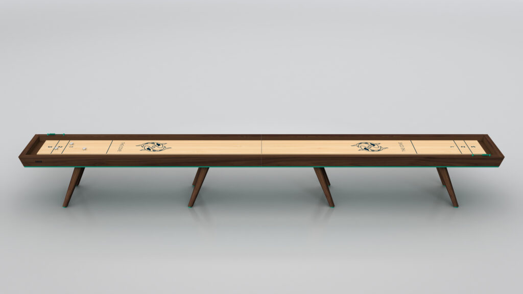 The Hamptons Shuffleboard Table features a light-colored playing surface, dark wood frame, three angled legs, and decorative shuffleboard markings for an elegant look.