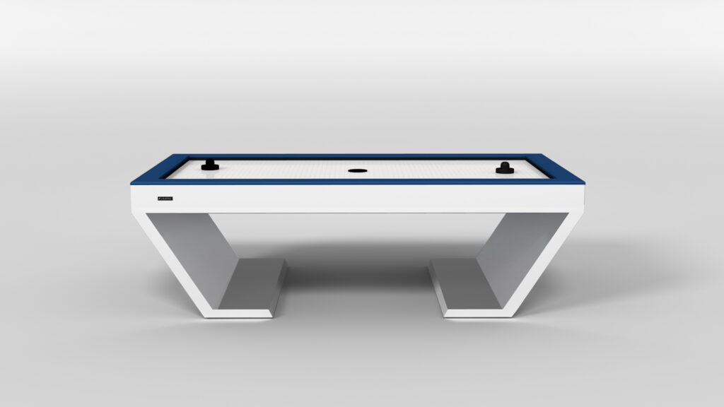 The Cabaret Air Hockey Table features a modern design with a blue border, two black pushers, and a white playing surface, all set against a plain white background.