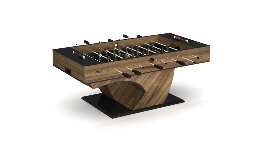 Introducing the Force Foosball Table, a modern marvel with a sleek wood finish and curved wooden base. This elegant table features black handles, sturdy metal rods with foosball players, and stands confidently on a dark platform.