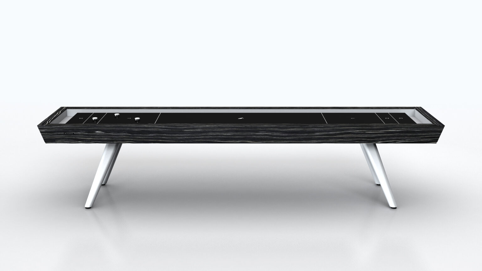 The Hamptons Shuffleboard Table features a modern rectangular design with a dark wood finish and angled white legs, displayed against a plain light background.