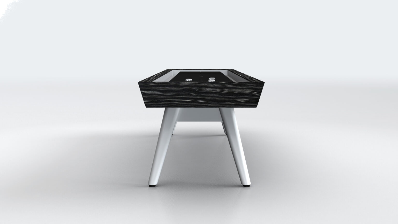 The Hamptons Shuffleboard Table features a sleek and luxurious design with a modern foosball twist, combining a dark wood frame and white legs against a light gray backdrop for a contemporary aesthetic.