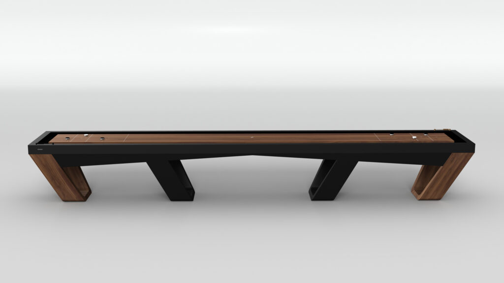 The Avettore Shuffleboard Table is a luxury game piece featuring a wooden playing surface, sleek design, and elegant black legs. Two sets of pucks are ready for play against a light gray wall backdrop.