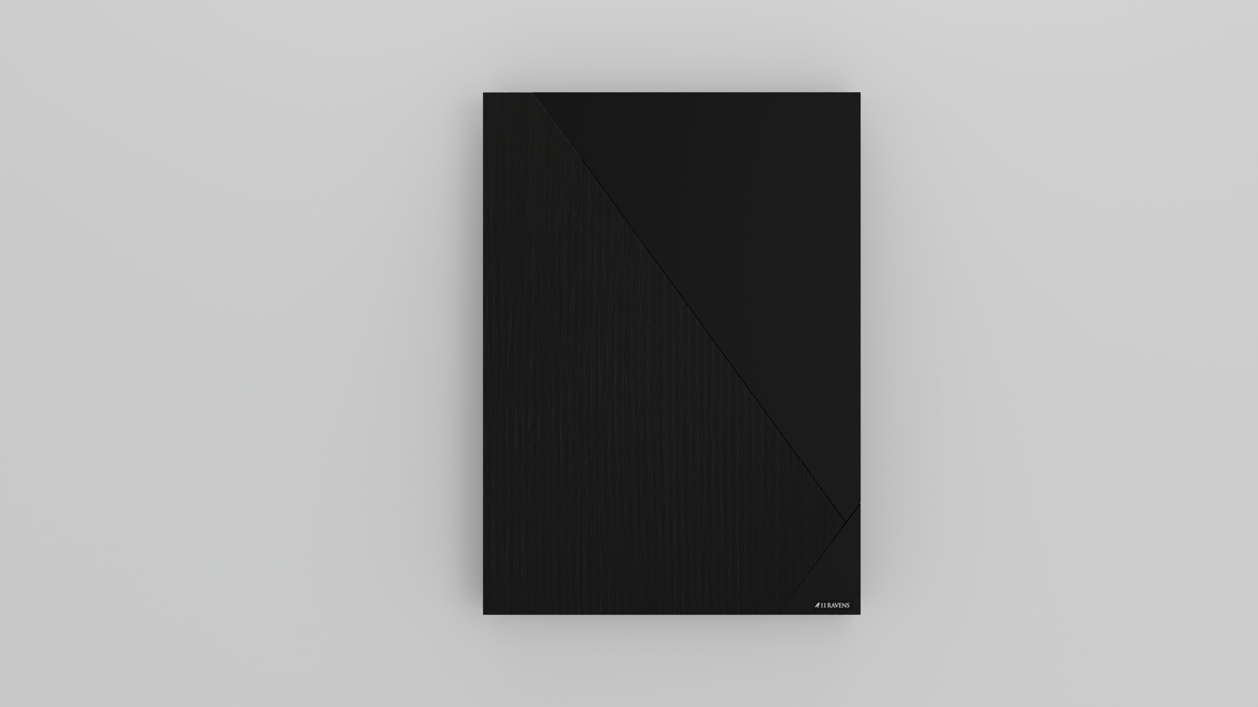 A rectangular, black external hard drive with a diagonal split design and small Seagate logo in the corner sits on a light gray background—offering a sleek look reminiscent of the Cardinal Dartboard.