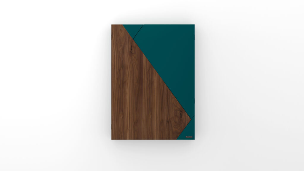 A rectangular object with a diagonal design, featuring wood grain on the left and bottom and solid teal on the top right, reflects the refined style of the Cardinal Dartboard, set against a plain white background.