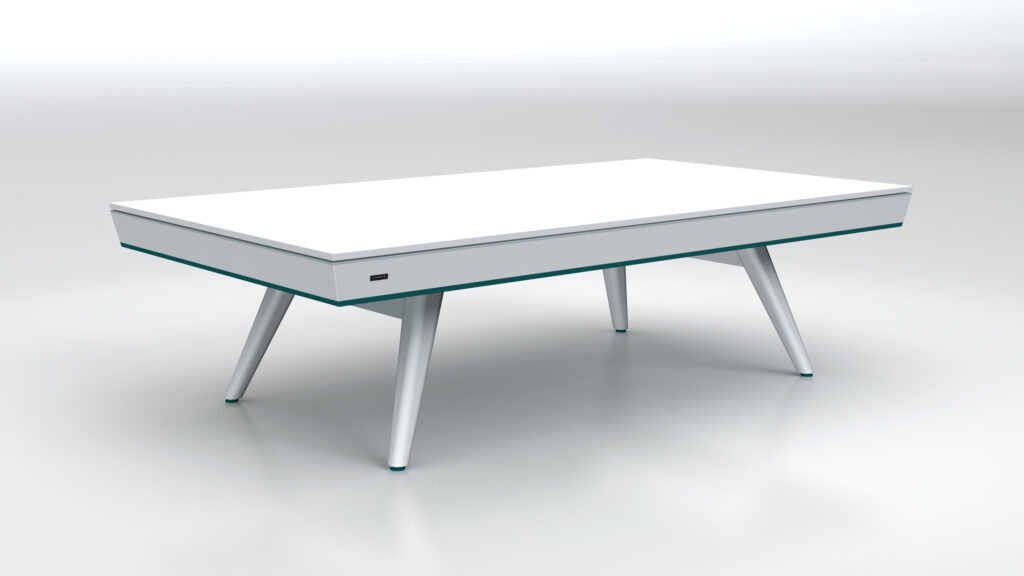 The Hamptons Convertible Pool/Dining/Ping Pong Table is a modern white rectangular table with sleek, tapered legs, reminiscent of luxury game tables, set against a plain white background. It boasts a minimalist design with subtle details and a smooth surface.