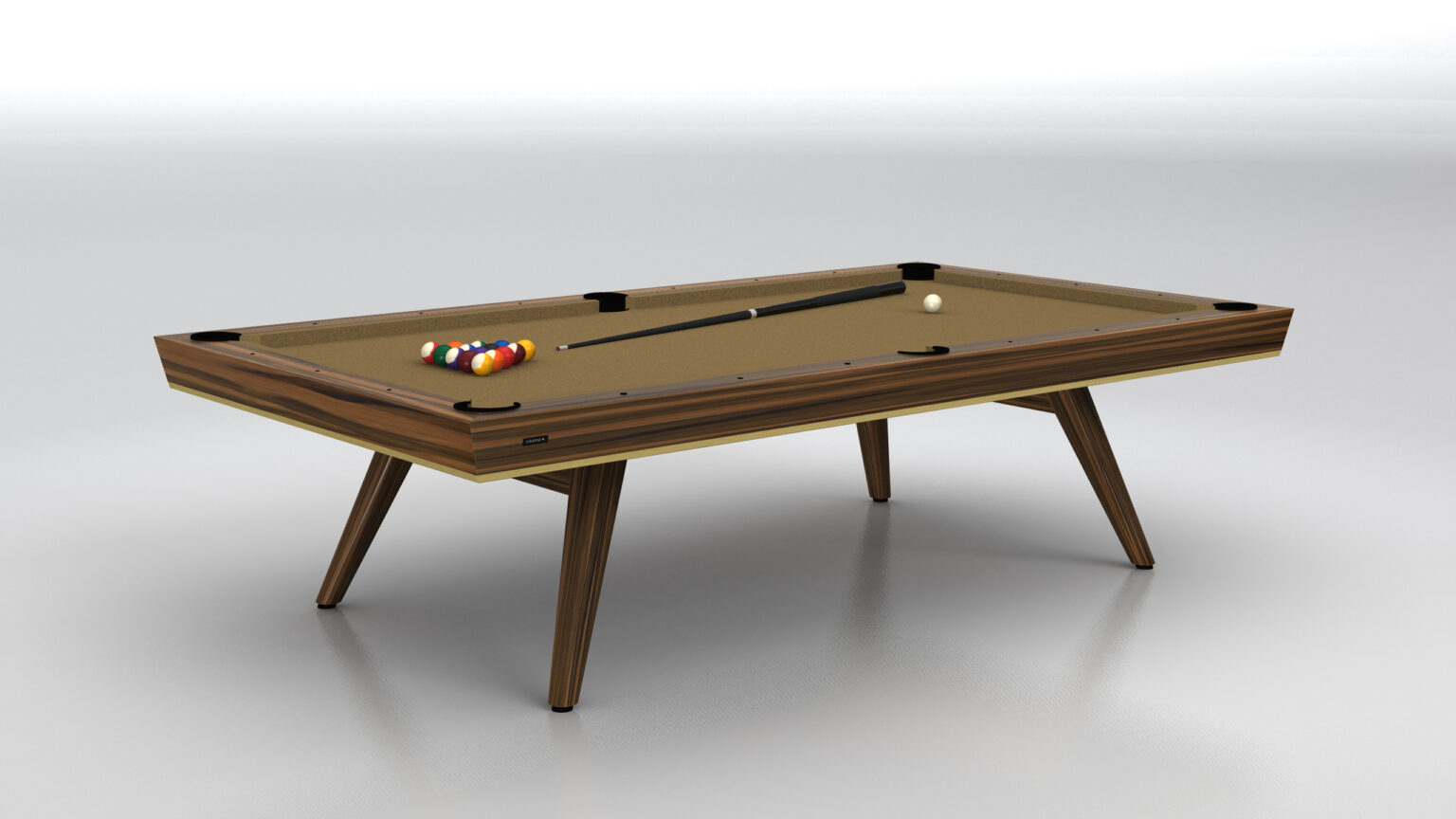 The Hamptons Pool Table, featuring a wooden finish and sleek design, stands in a minimalist room, epitomizing luxury game tables. At one end, colorful billiard balls are set with a cue stick and white ball ready for play on its light brown felt surface.