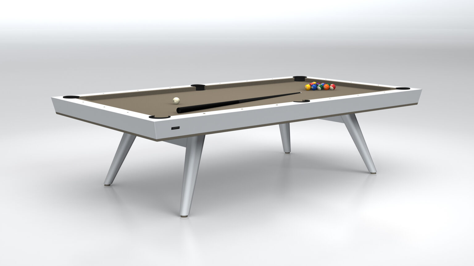 The Hamptons Pool Table, part of a luxury collection, boasts a sleek white frame and beige playing surface. With pool balls neatly arranged and the cue ball positioned separately, its angled legs provide support in a minimalist setting.