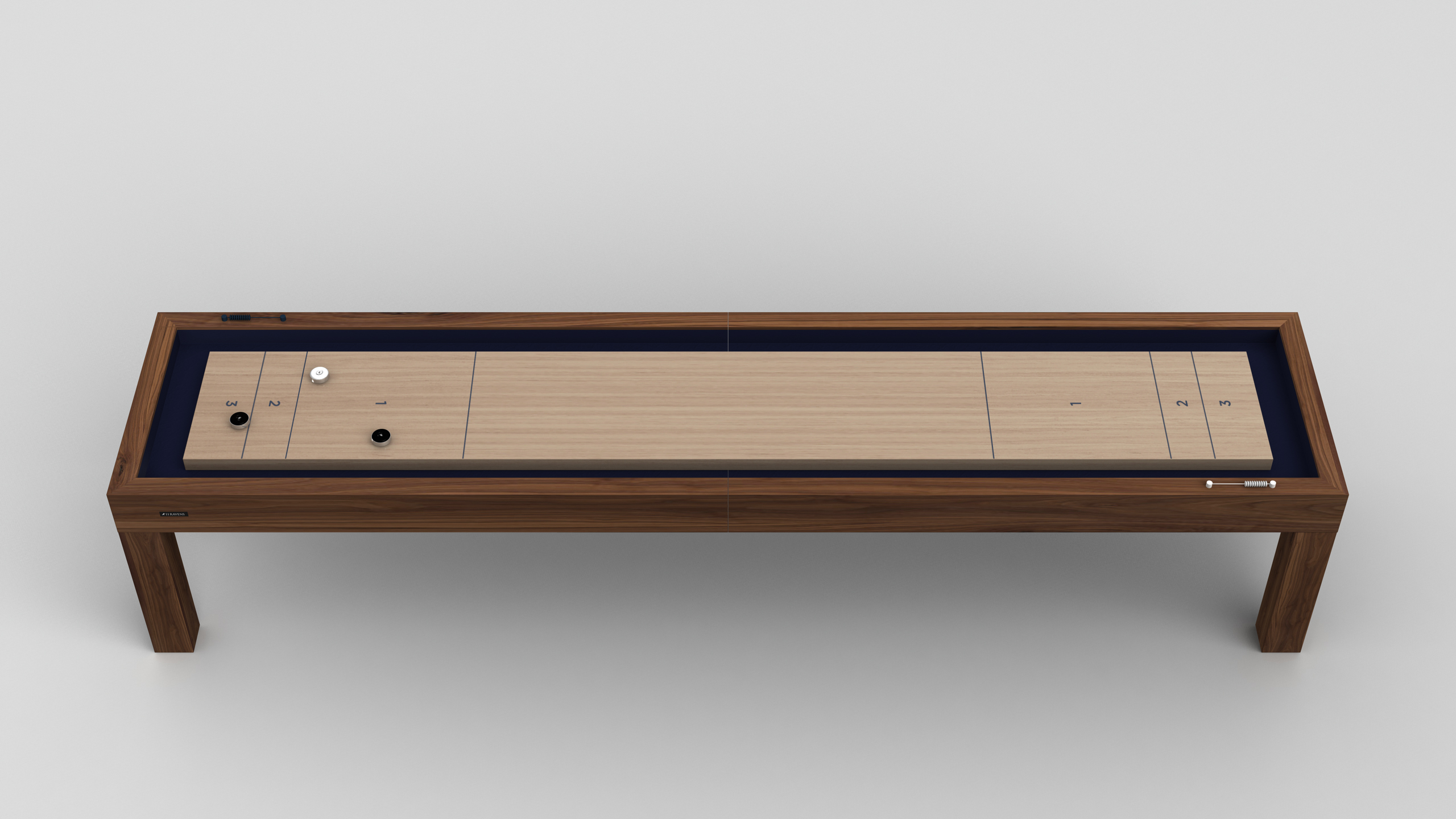 The Malibu Shuffleboard Table features a light wooden playing surface, blue borders, and several pucks at one end, standing alone against a plain, light background.