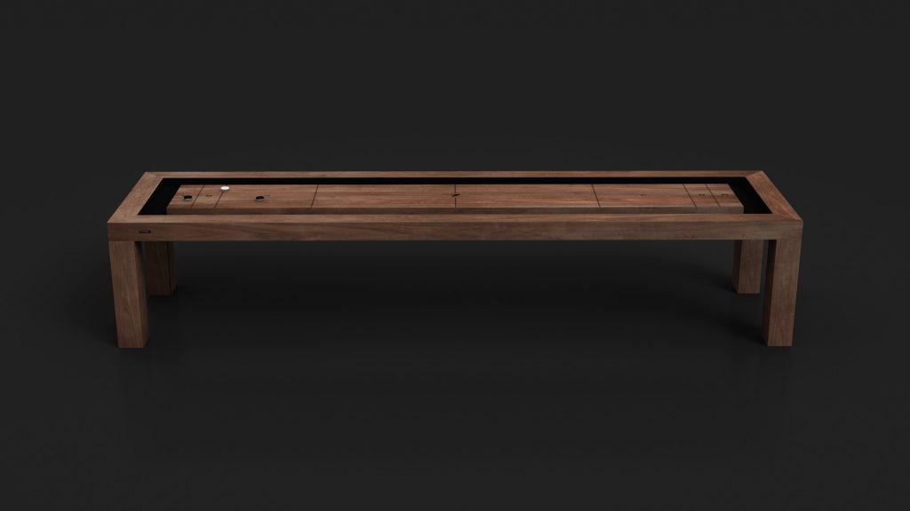 A sleek, modern wooden Malibu Shuffleboard Table features a hidden compartment on its surface. With a minimalist design and dark background, it highlights clean lines and craftsmanship reminiscent of luxury.