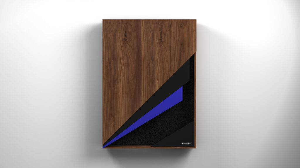 The Starling Dartboard is a rectangular wall panel with a wood grain finish, featuring black and blue geometric shapes in the lower right corner. Its plain white background and soft shadow give it a sleek, modern look.