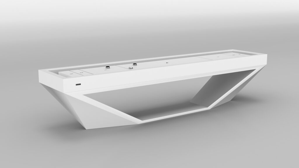 The Stealth Shuffleboard Table, a sleek and modern piece in white, features geometric design elements with a triangular cutout base reminiscent of luxury game tables. Set against a plain, light-colored background, it highlights minimalist style and sophistication.