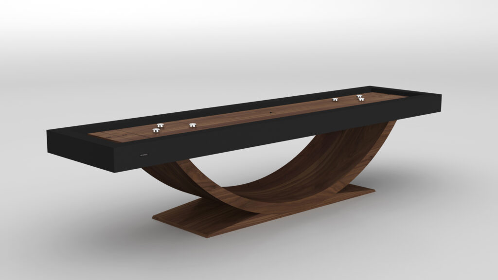 The Theseus Shuffleboard Table features a black rectangular top and a curved wooden base, shown against a plain white background with pucks placed on its surface.
