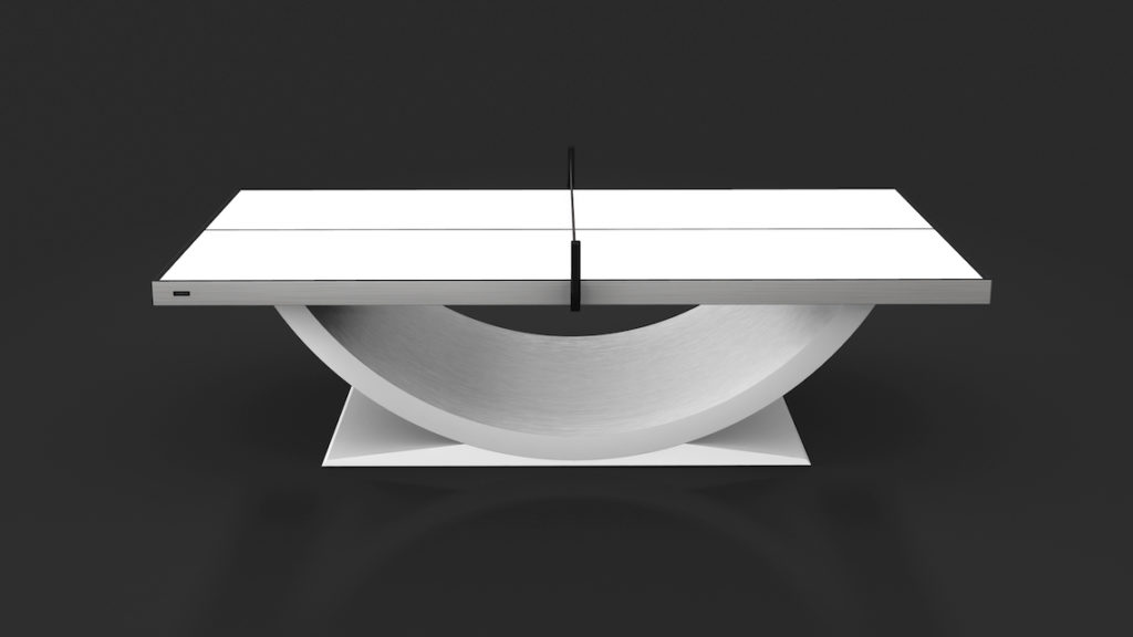The Theseus Ping Pong Table is a modern, minimalist luxury game table featuring a smooth curved white base and sleek white tabletop, elegantly set against a dark background.