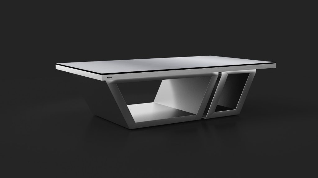 A modern, angular glass-top coffee table with a geometric design and metallic finish is set against a dark background, highlighting its sleek style reminiscent of the luxurious Titan Convertible Pool / Dining / Ping Pong Table.