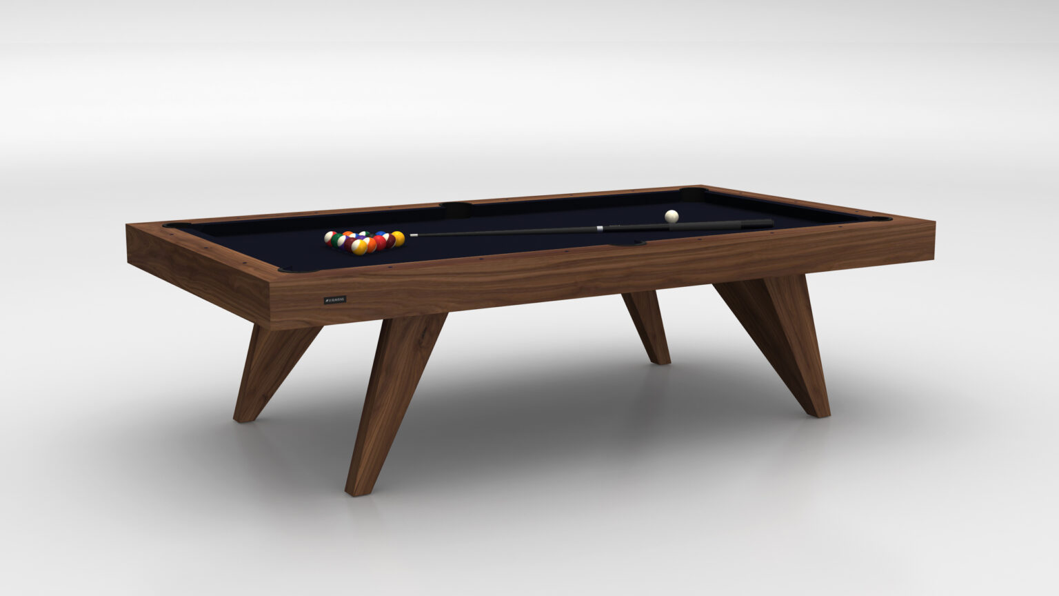 The Trigon Pool Table is a luxurious game table with a sleek design on a light gray background, featuring a black playing surface, neatly arranged pool balls, and a cue stick elegantly resting on it.