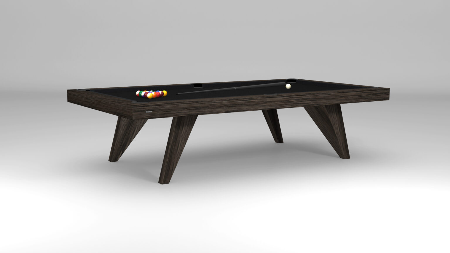 The Trigon Pool Table, featuring a sleek design and dark wooden finish, stands on a gray floor, complete with colorful billiard balls and a white cue ball ready for play.