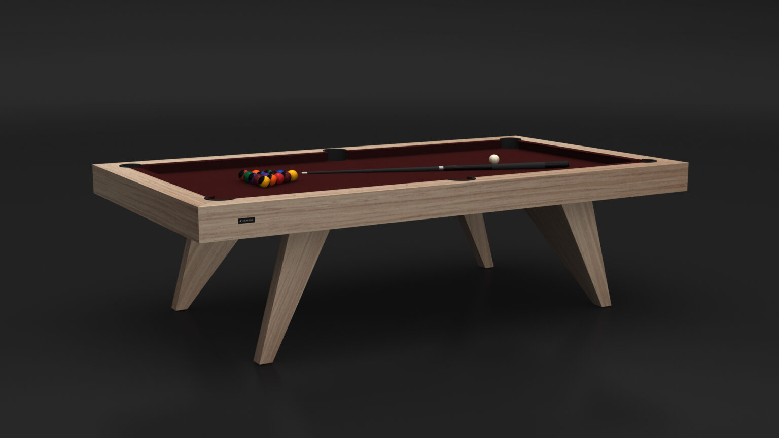 The Trigon Pool Table boasts a sleek wooden frame and maroon playing surface. It includes a cue, racked colorful balls, and a cue ball, all set against a dark backdrop for a luxury gaming experience.