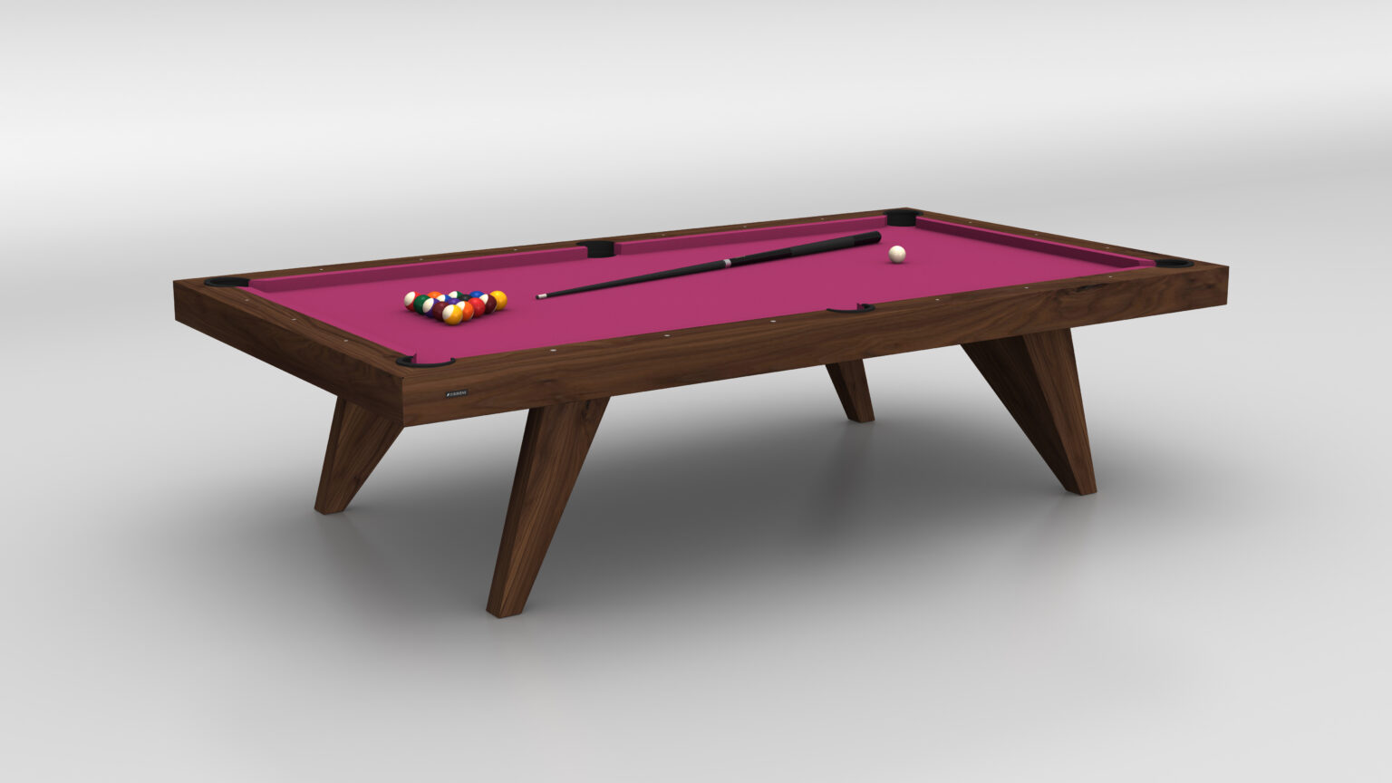 The Trigon Pool Table, with its pink felt surface, features racked colorful billiard balls, a cue stick, and a white cue ball. Its sleek wooden frame adds sophistication and blends perfectly with the neutral background.