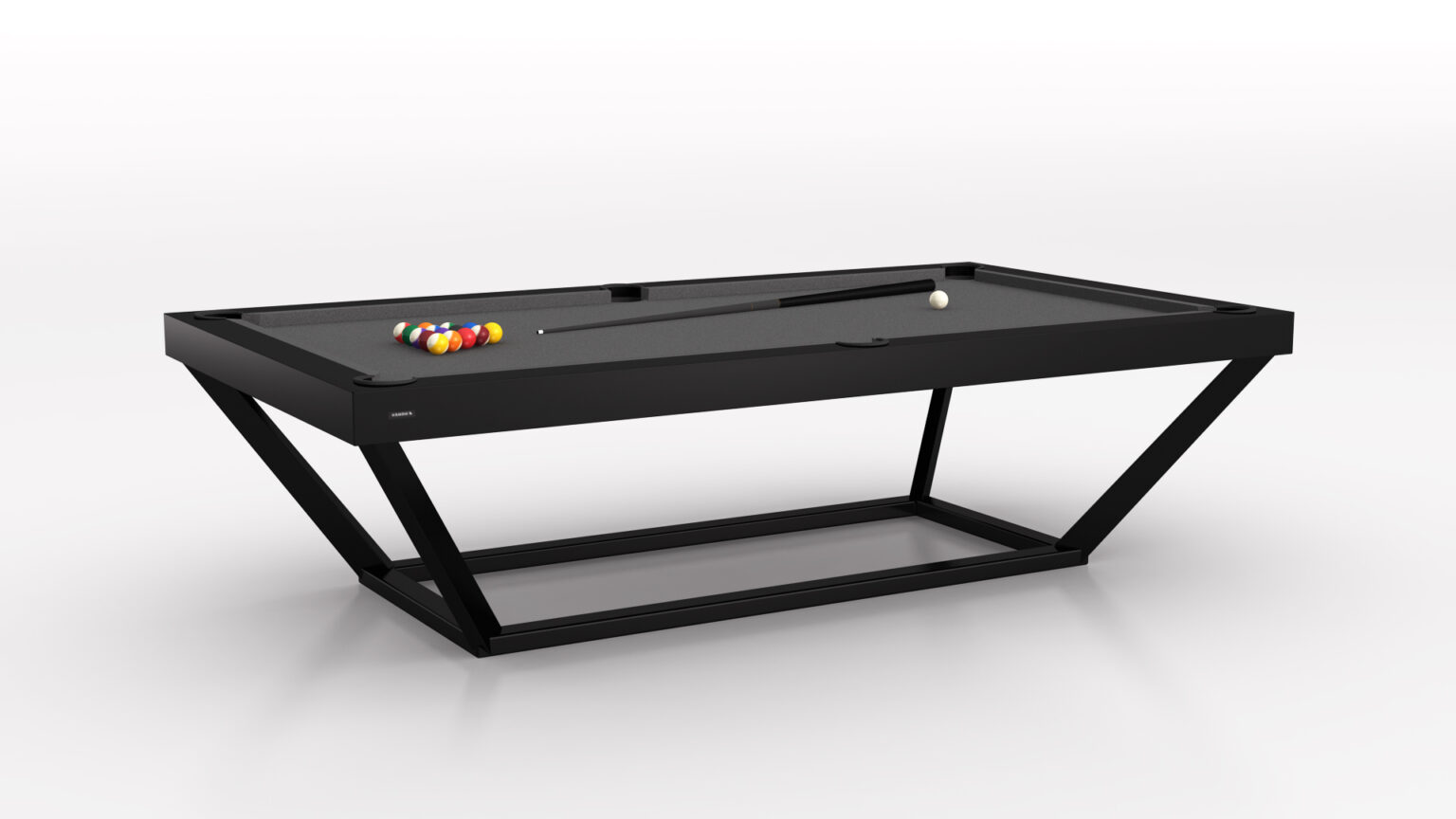 The Vitro Pool Table, a modern black design with a sleek angular base, epitomizes luxury. With a triangle rack of colorful billiard balls and a cue stick elegantly placed on top, its charm is enhanced by the pristine white background.