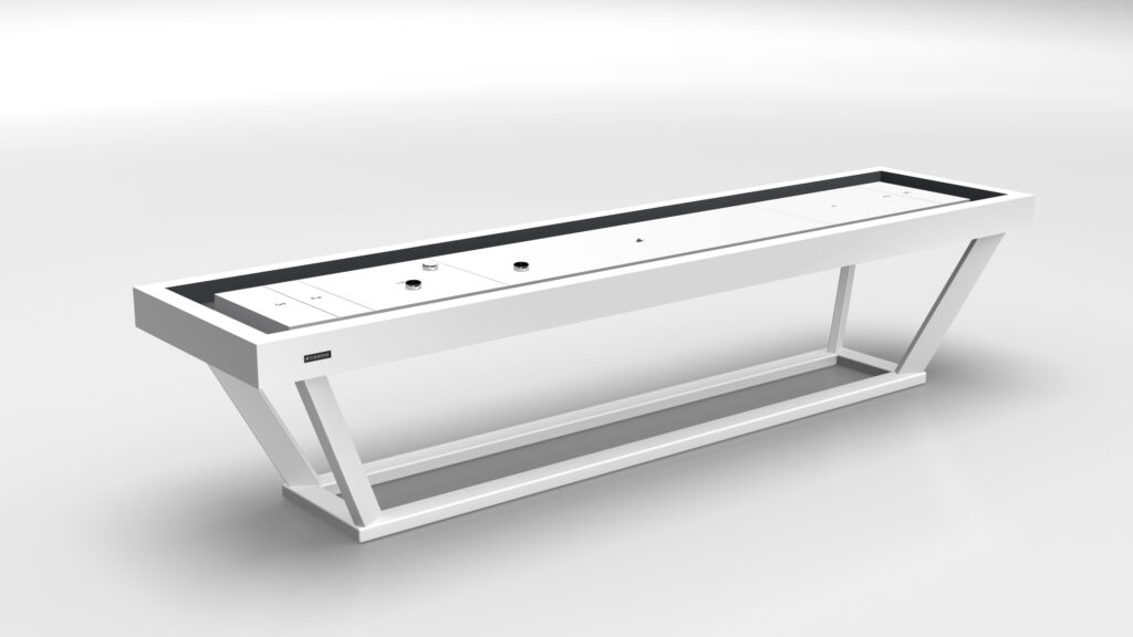 A modern, minimalist white desk with a rectangular top and geometric angled legs echoes the elegance of the Vitro Shuffleboard Table, featuring a few small embedded controls on its surface.