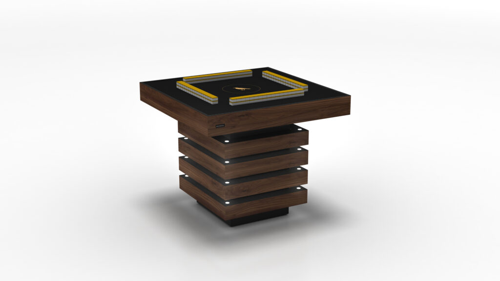 The Theseus Mahjong Table is a modern, square pedestal inspired by luxury game tables, featuring a black top with yellow accents. Its base has stacked wooden rectangular layers and small circular lights between each layer, creating a sleek and contemporary design against a white backdrop.