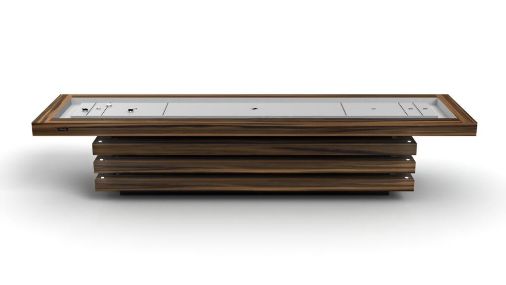 The Arclight Shuffleboard Table features a rectangular, minimalist design with a striped wood pattern, wooden base, and built-in metallic panel on top—blending modern elegance inspired by luxury furnishing.