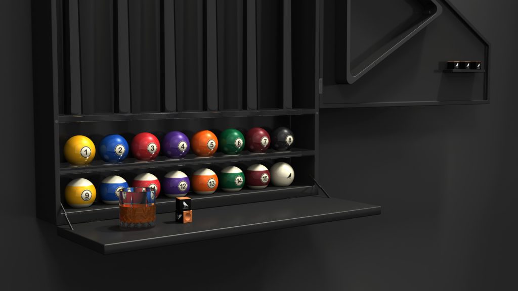 The elegant Arella Cue Rack is a chic black billiard rack with two shelves, showcasing a full set of vibrant billiard balls. A glass with amber liquid and a cube-shaped item sits on the table, while sleek black decor in the background amplifies its sophistication.