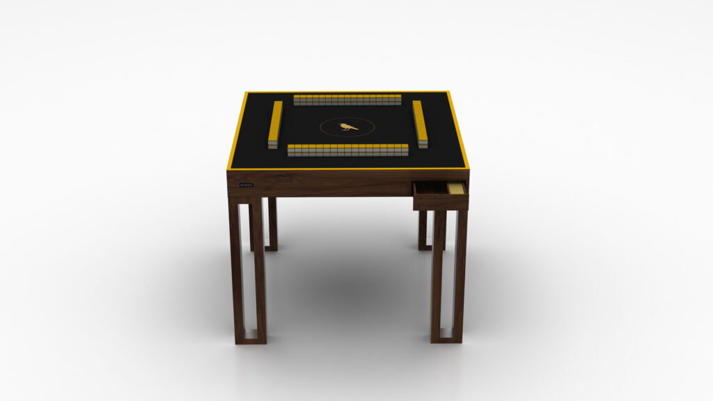 The Theseus Mahjong Table is a sleek luxury gaming table with a modern square design, featuring a dark surface, striking yellow borders, a central circle, and rows of rectangular tiles. It has wooden legs and an open drawer on one side against a plain white background.