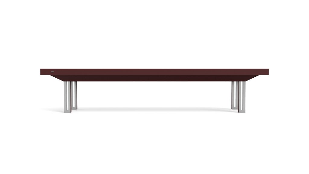 The Executive Shuffleboard Table boasts a sleek, modern design with a dark brown rectangular top and four silver cylindrical legs, resembling an upscale shuffleboard table set against a white background.