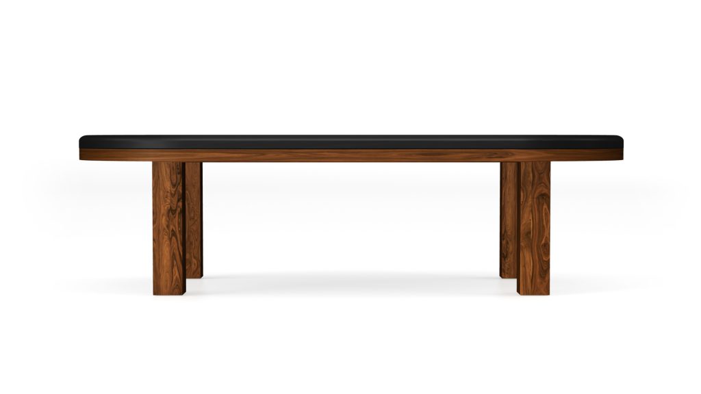 A luxurious rectangular wooden table with four sturdy legs and a dark, smooth tabletop exudes elegance, contrasting rich brown wood with a sleek black surface, reminiscent of the Malibu Oval Poker Table.