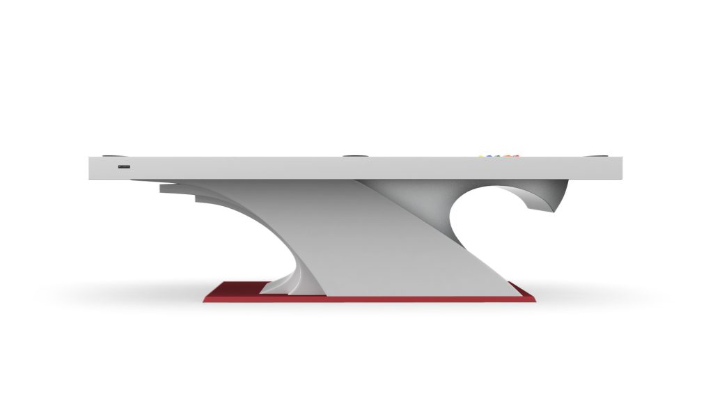 Elevate your space with our luxe ping pong table, inspired by the Poseidon Pool Table. It features a sculptural base, eye-catching red platform, and a white surface adorned with colorful accents on one end for a minimalist flair.