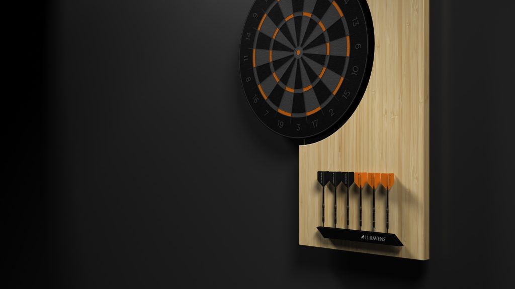 The Robin Dartboard, paired with black and orange darts, is elegantly displayed on a dark wall, creating a sleek and sophisticated atmosphere.