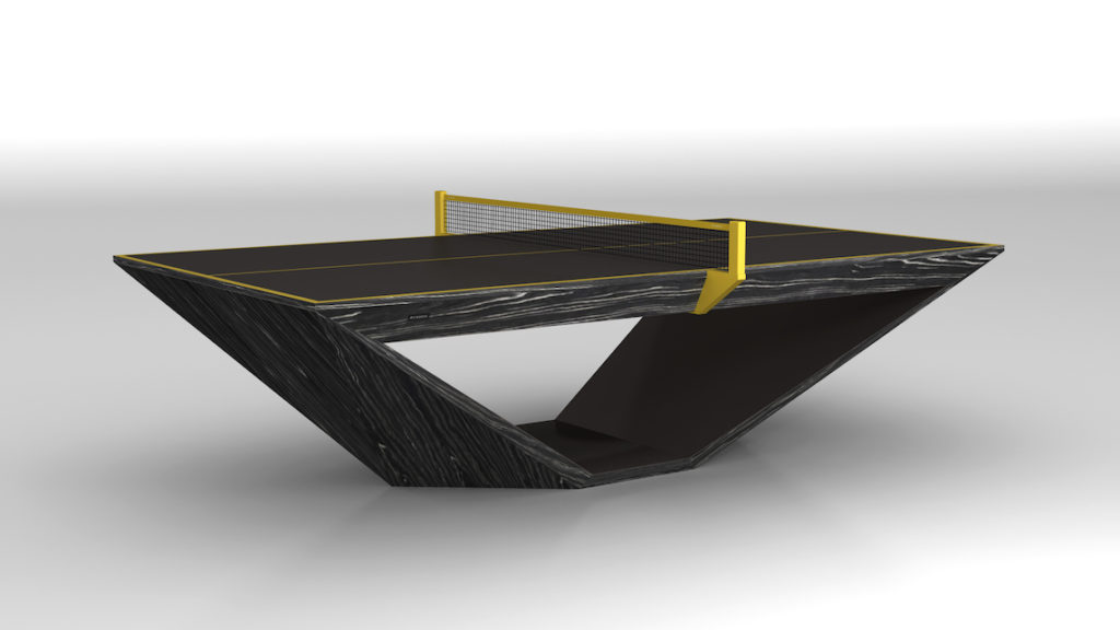 The Stealth Ping Pong Table captures luxury with its modern angular design, sleek black surface, and golden net supports. Set against a minimalist white background, it features a geometric sculptural base for an elegant touch.