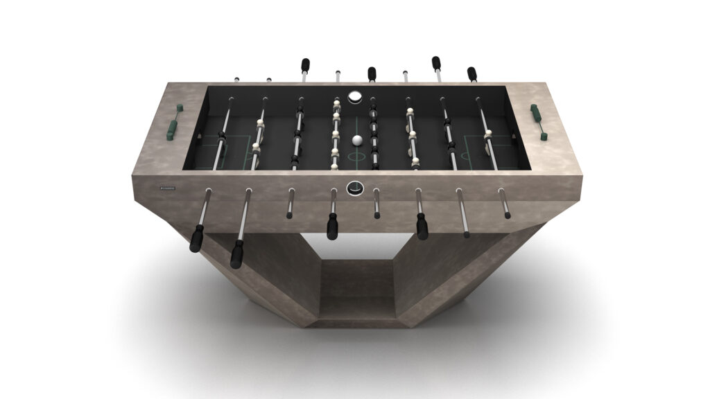 Stealth Foosball Table featuring a modern, minimalist design with a sleek angular concrete base, black handles, and visible playing rods and miniature players against a white background.