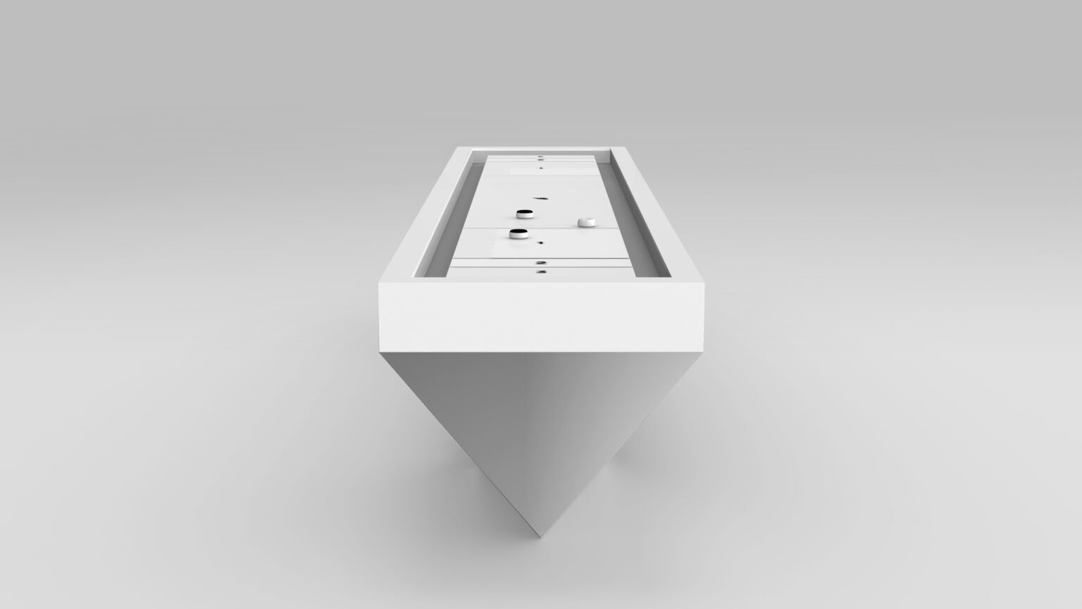 The Stealth Shuffleboard Table features a minimalist white geometric design with a triangular base and rectangular top, adorned with small circular indents. This luxurious piece stands elegantly against a neutral gray background, evoking the refinement of upscale game tables.