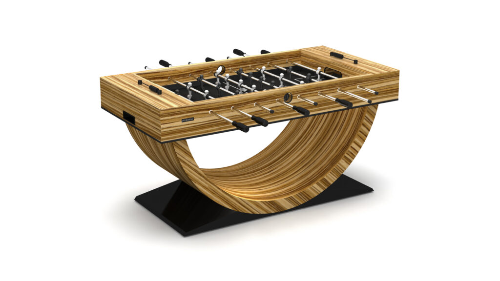 The Theseus Foosball Table features a modern wooden finish, a unique curved base, sleek black and silver rods and handles, all set on an elegant black platform.