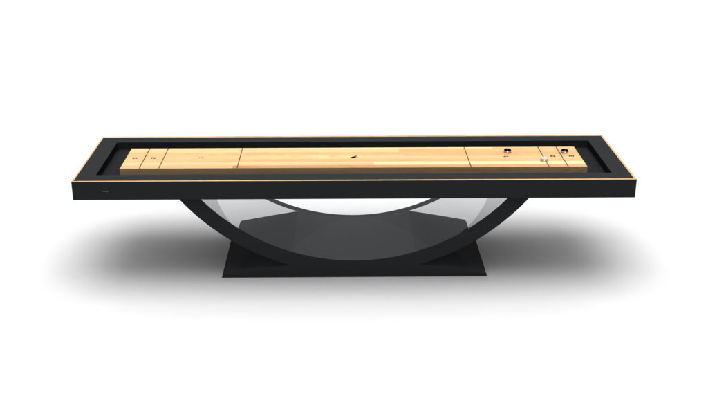 The Theseus Shuffleboard Table boasts a black frame, light wood playing surface, and curved pedestal base, creating a striking modern centerpiece against a white backdrop.