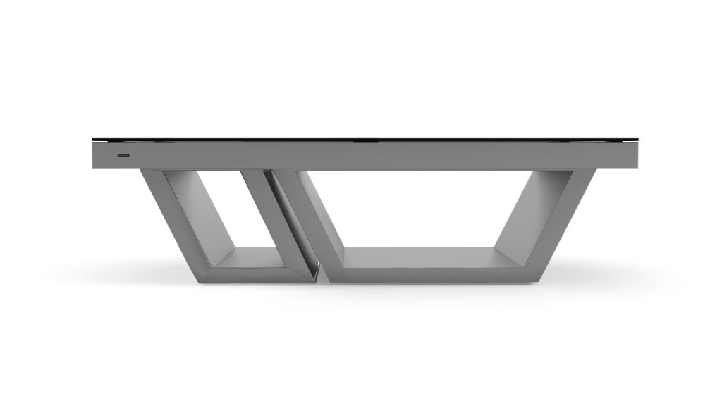 A modern coffee table with a glass top and geometric metal base mirrors the sophistication of the Titan Convertible Pool/Dining/Ping Pong Table. Two triangular supports enhance its sleek, contemporary look against a plain white backdrop.