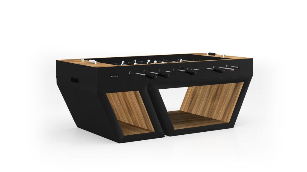 Explore the Titan Foosball Table, featuring a sleek minimalist design with a black exterior, wooden accents, and an open-sided rectangular frame. The playing rods and handles elegantly sit atop, complemented by a stylish wooden interior shelf.