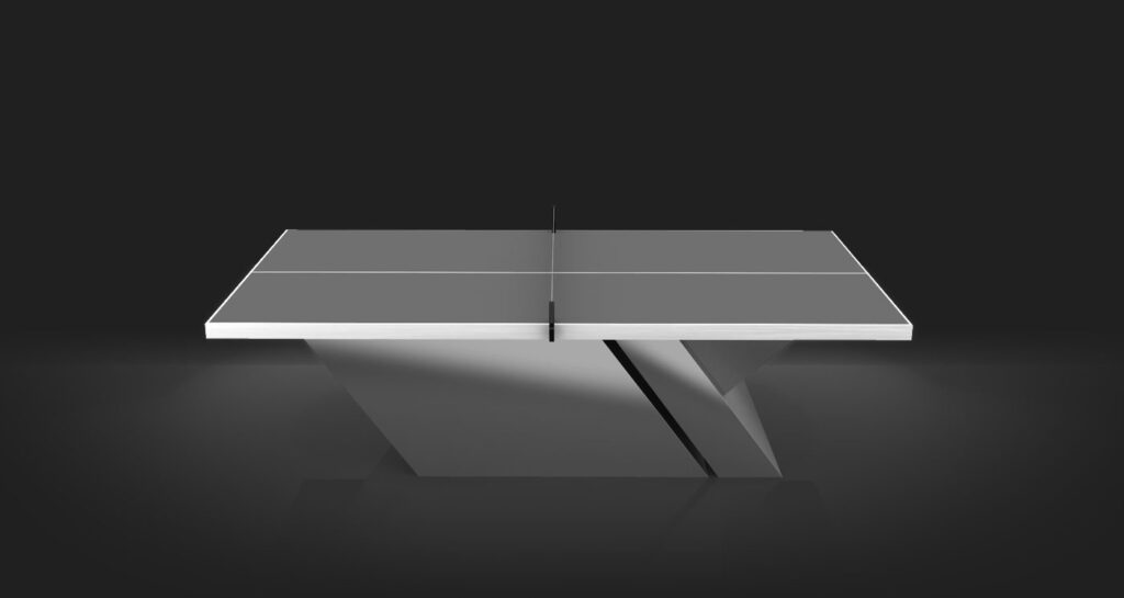 The Titan Ping Pong Table showcases a sleek gray playing surface and an angular metallic base, combining modern minimalist design with luxury style, all set against a dark background.
